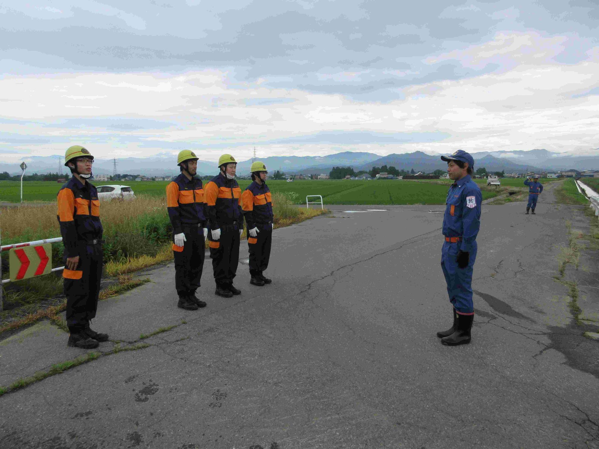 小其塚部落と矢野目地区の継ポンプ訓練05